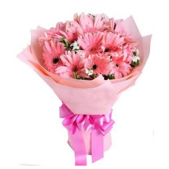 12 Pink Gerbera in a Bouquet Send to Philippines